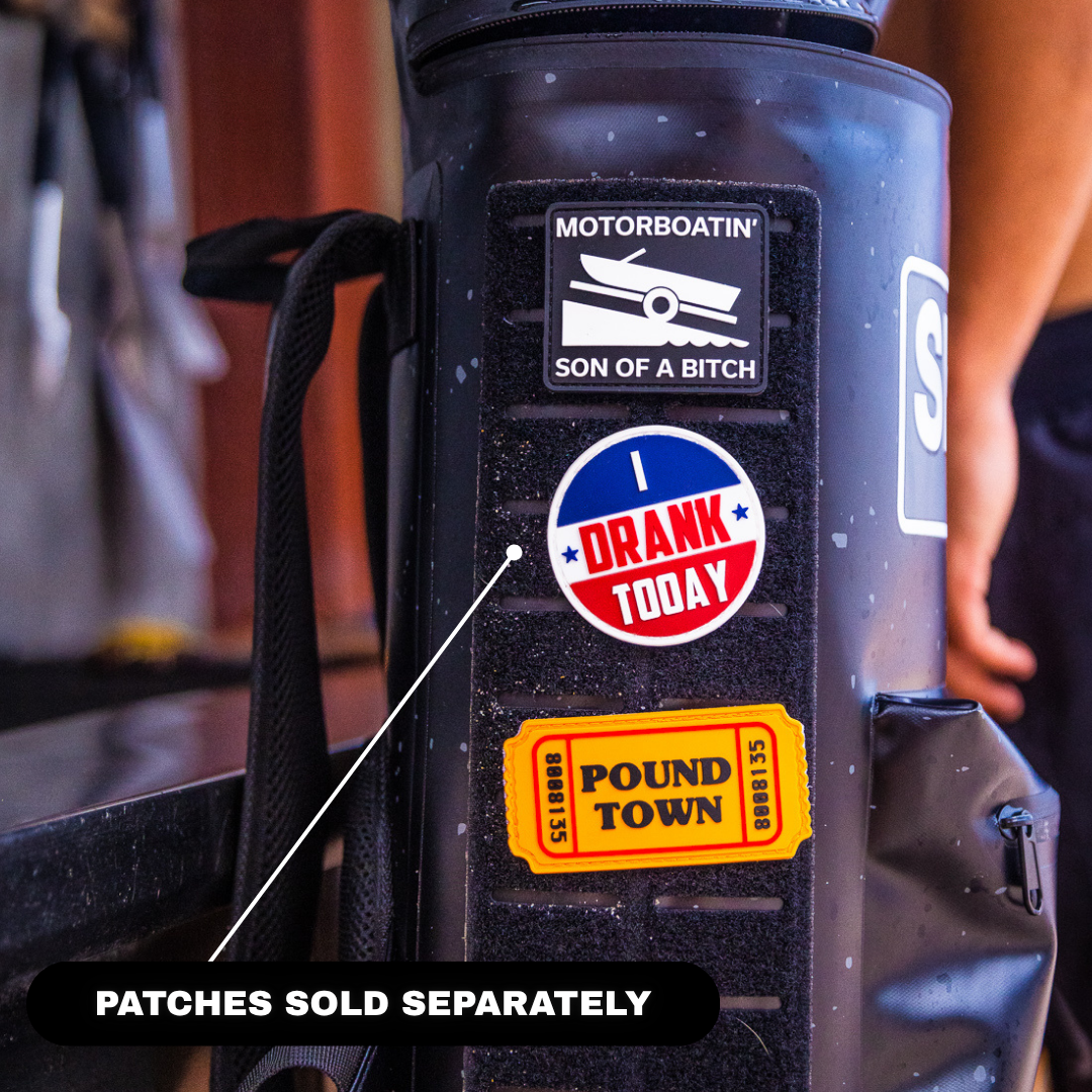 Blackout Backpack Cooler with patches attached, designed to hold 15 cans for easy transport to parties and events.