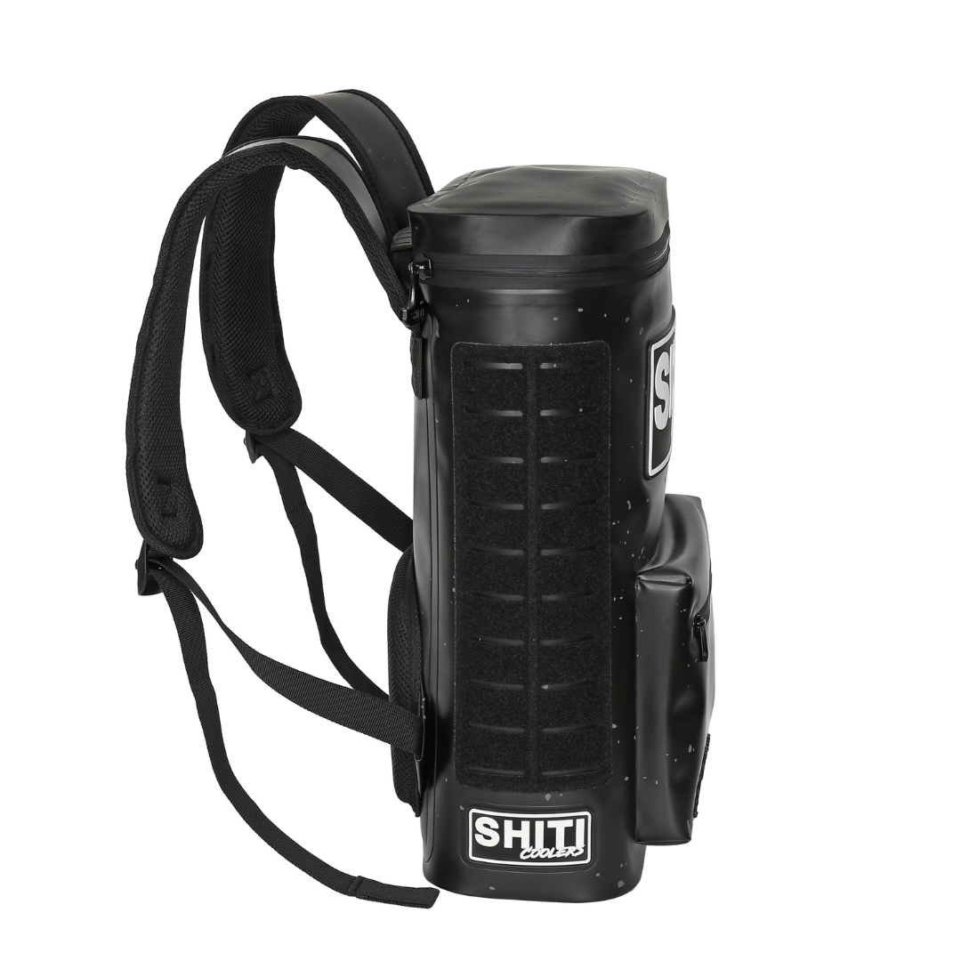 Blackout Backpack Cooler designed to hold 15 cans, featuring adjustable straps and a sleek black exterior for easy transport.