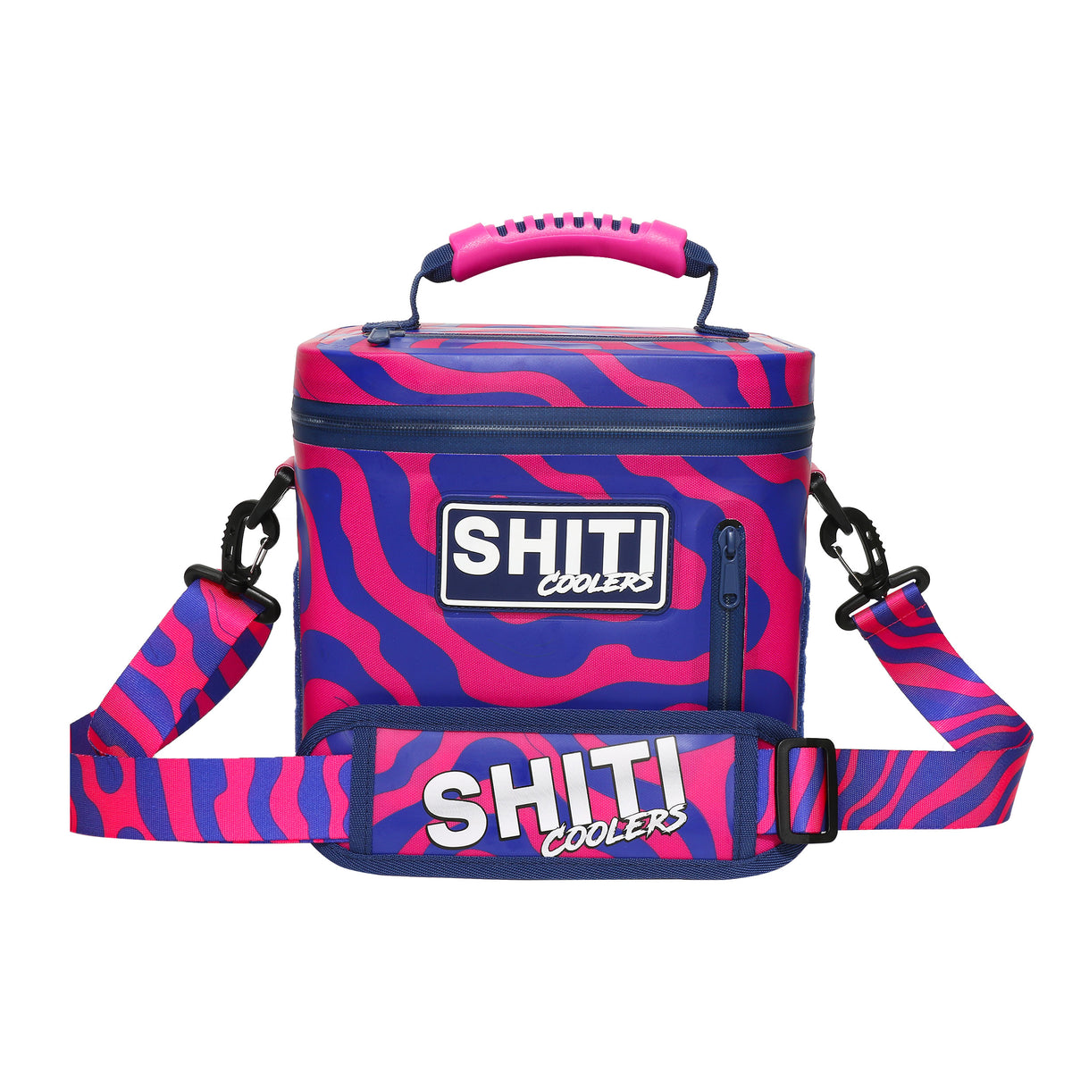 Vibrant Daytripper Soft Cooler in pink and blue zebra pattern, designed to hold 6 cans, featuring a sturdy handle and adjustable strap.