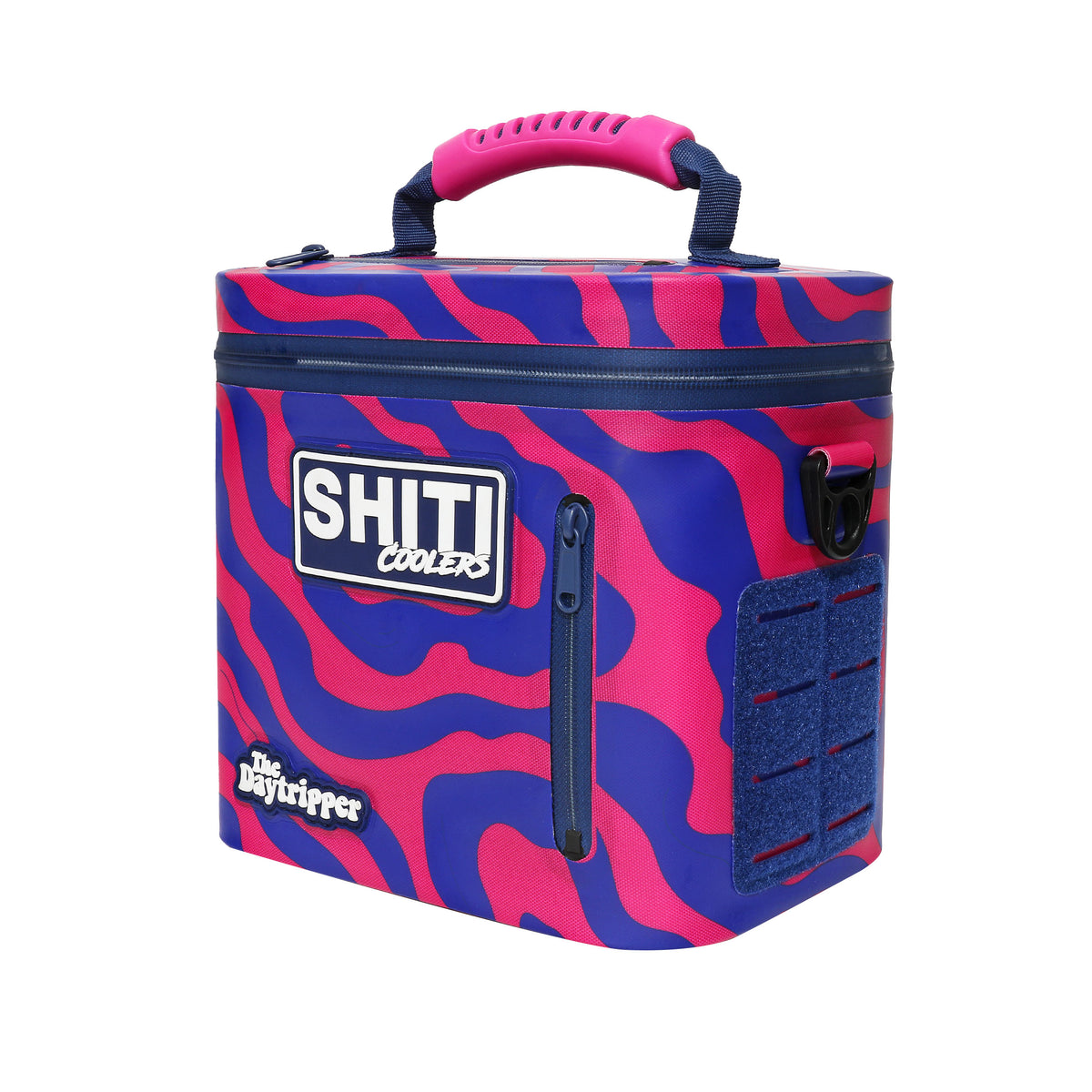 Vibrant blue and pink Daytripper Soft Cooler designed to hold six cans, featuring a sturdy handle and side pocket.