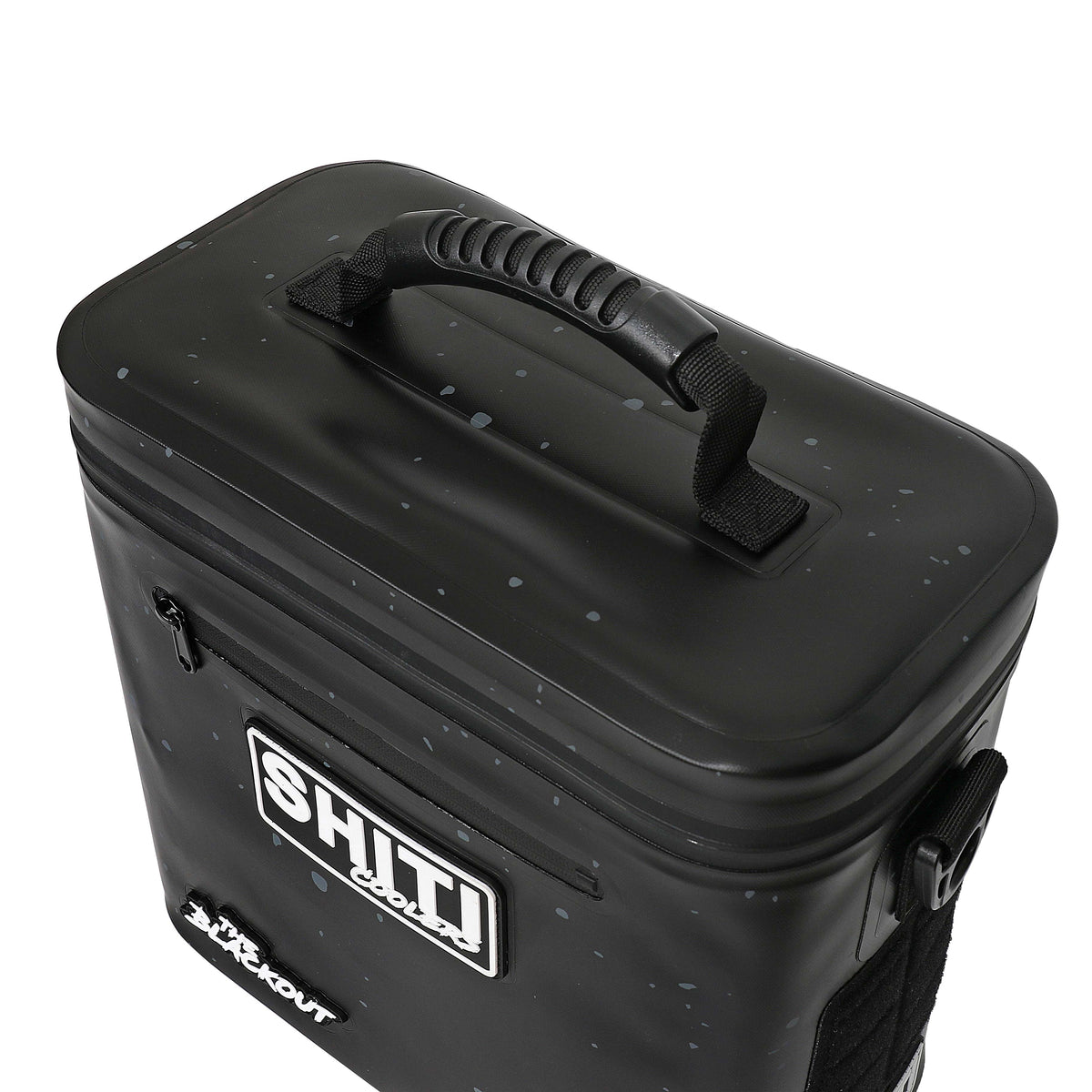 Blackout Soft Cooler in black, designed to hold 12 cans, featuring a sturdy handle and a sleek, waterproof exterior.