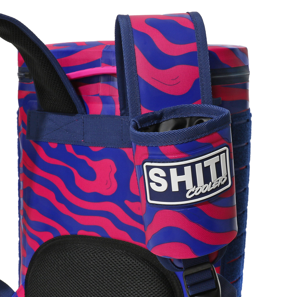 Vibrant Daytripper Backpack Cooler featuring a pink and blue wavy design, designed to hold 15 cans comfortably.