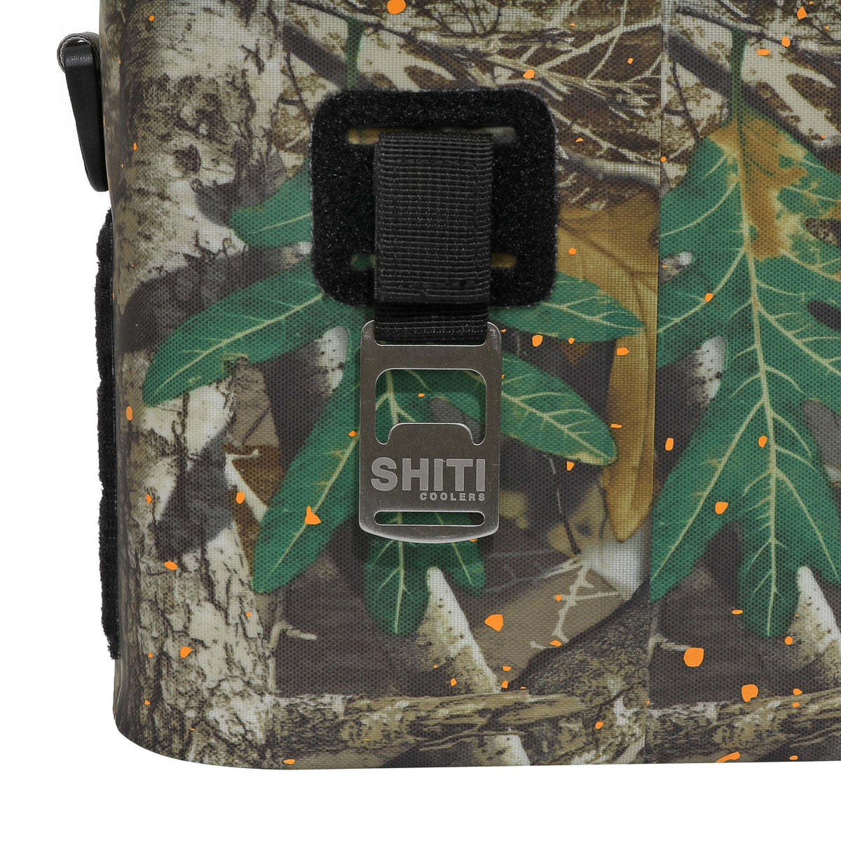 Realtree Soft Cooler featuring a camouflage design with green leaves and a sturdy strap buckle for secure closure.