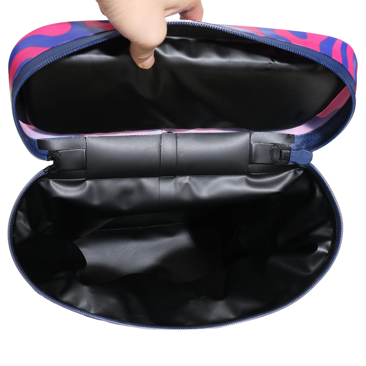 Interior view of the Daytripper Backpack Cooler showing a spacious, insulated compartment designed to hold 15 cans.