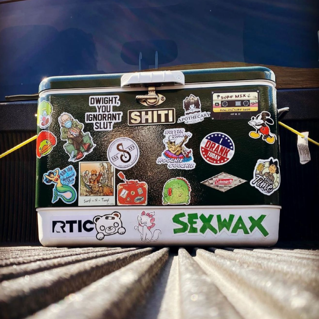 Customizable cooler adorned with various colorful stickers, featuring the SHITI logo and a chrome brand plate.