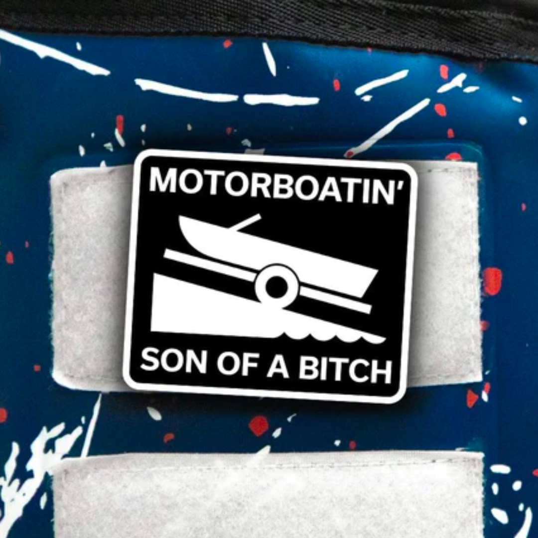 Black and white Velcro patch featuring a boat on water with the text &quot;MOTORBOATIN&#39; SON OF A BITCH.