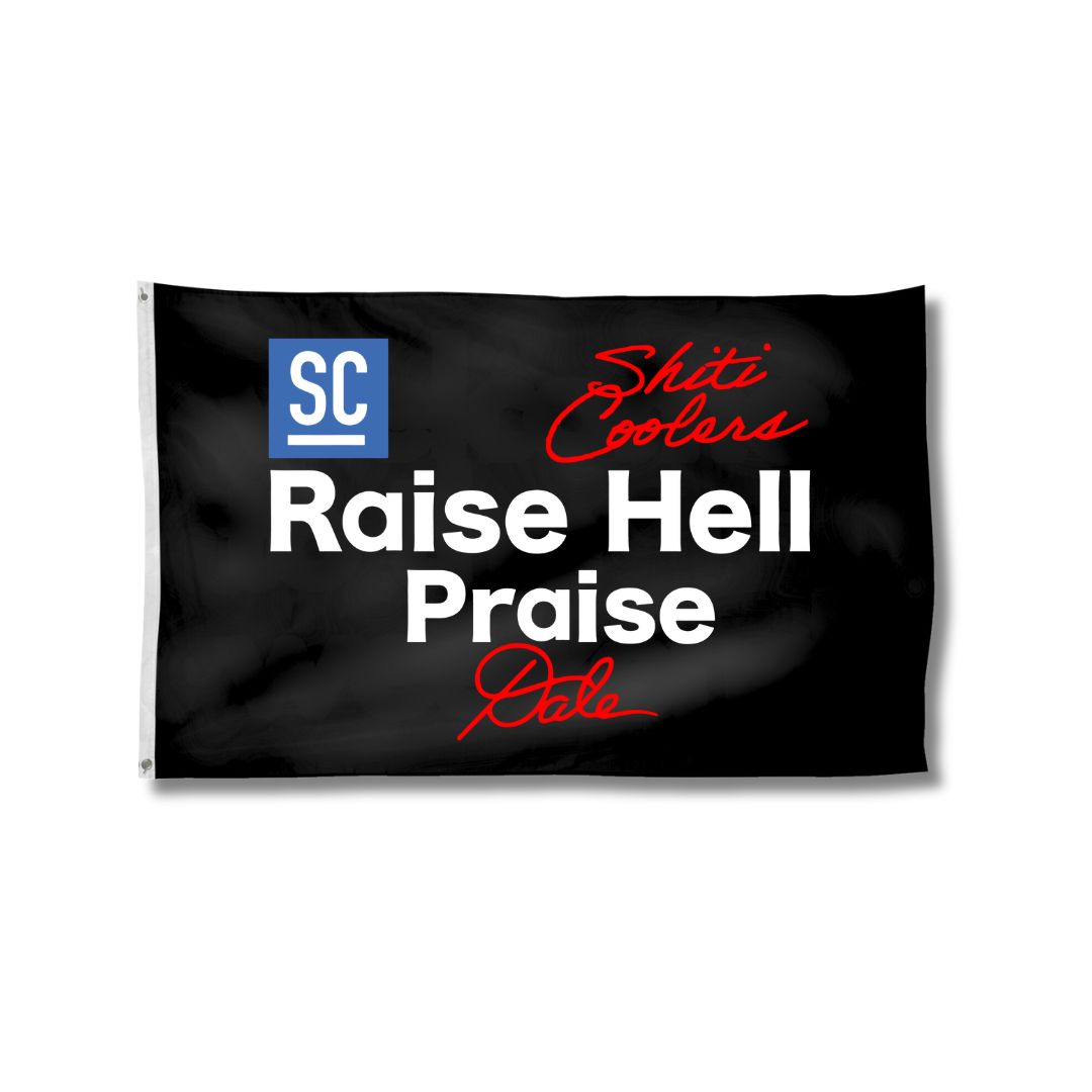 Black flag featuring bold white text that reads "Raise Hell Praise Dale" with the SHITI Coolers logo.