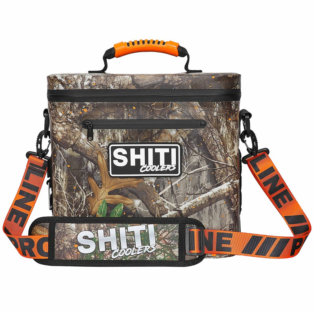 Realtree Soft Cooler designed to hold 12 cans, featuring a camouflage pattern and adjustable shoulder strap for easy transport.