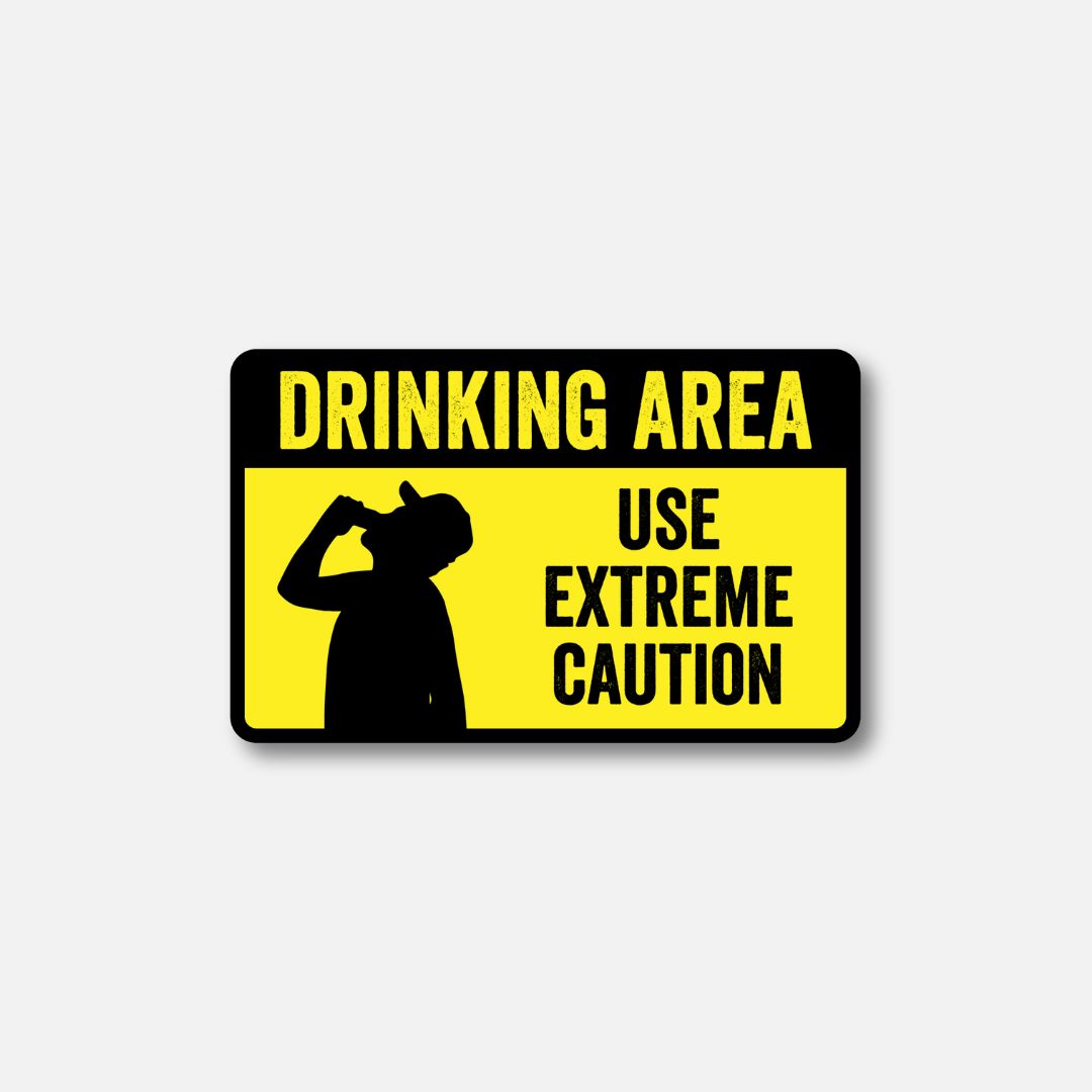 Velcro patch featuring a silhouette of a person drinking, with the text &quot;Drinking Area Use Extreme Caution&quot; in bold yellow and black.