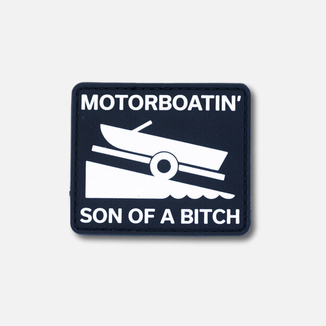 Motorboatin' Velcro patch featuring a boat graphic and humorous text, ideal for outdoor enthusiasts and boat lovers.