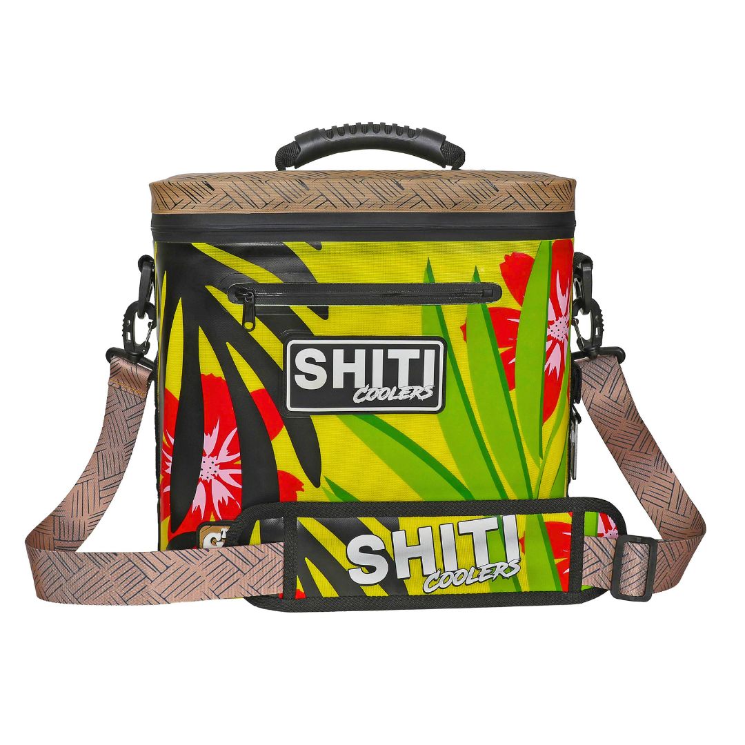 Vibrant Getaway Soft Cooler with tropical design, holds 12 cans, featuring a sturdy handle and adjustable shoulder strap.
