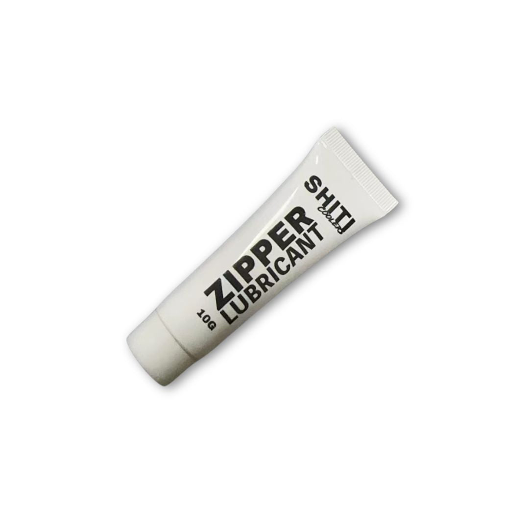 SHITI Cooler Zipper Lubricant in a small white tube, designed for smooth zipper operation and maintenance.