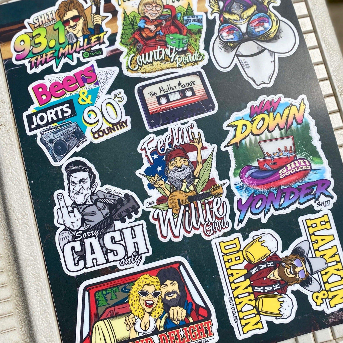 A collection of ten colorful country music-themed stickers featuring various designs and characters.