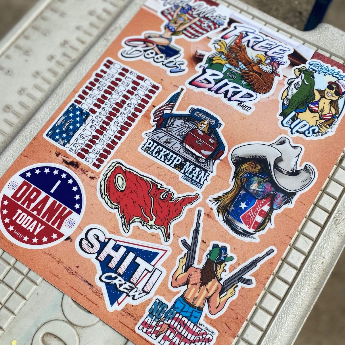 A collection of ten &#39;Merica-themed stickers featuring patriotic designs, including flags, animals, and humorous phrases.