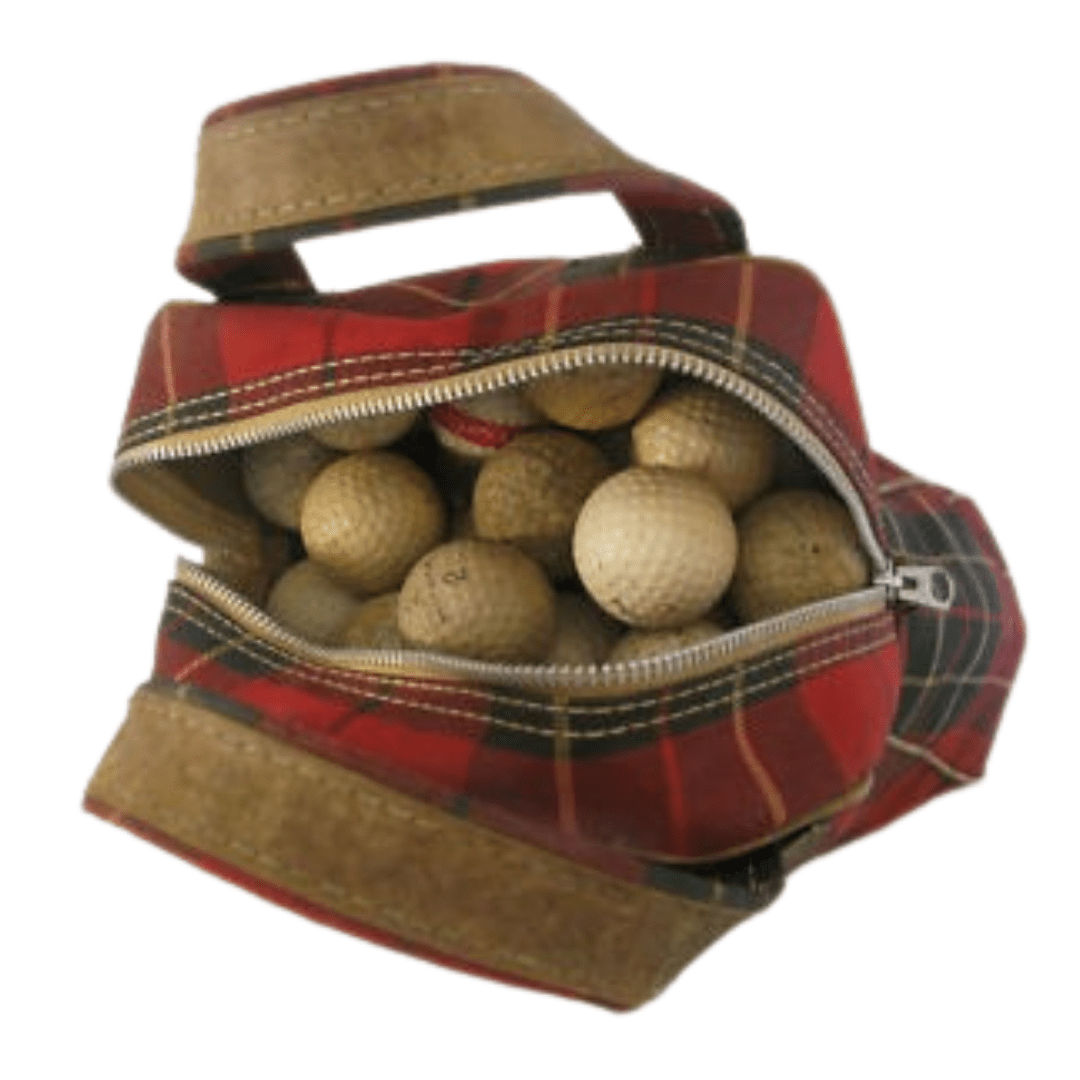 A red plaid bag unzipped, filled with multiple golf balls, showcasing a mix of colors and textures.